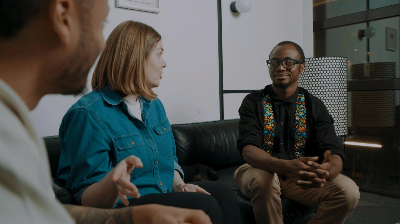 Breakthrough team members discussing ideas